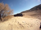 connors zj jeep running up a  sand hill at box canyon in wickenburg