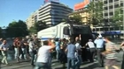 Turkish demonstrators attack police vehicle
